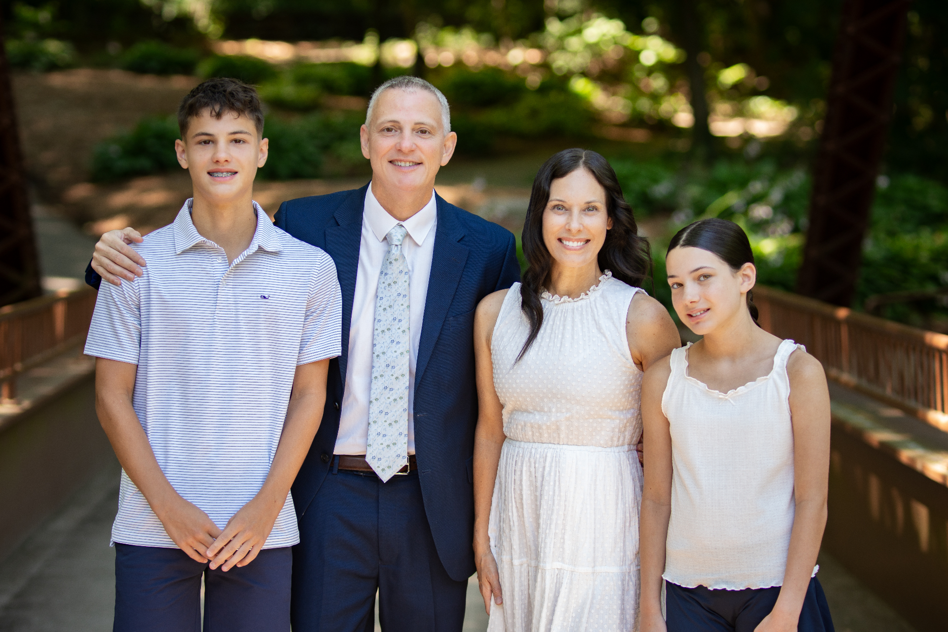 Brian Quattrocchi with his family outdoors